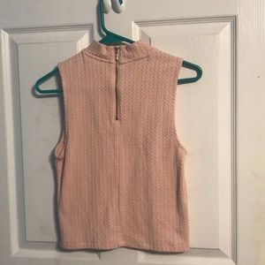 Pink sleeveless top